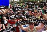 Juventus soccer fans show their scarves to remember the Heysel tragedy at  the King Baudouin stadium in Brussels, Sunday May 29, 2005. Fans from  Britain, Italy and Belgium marked the Heysel tragedy